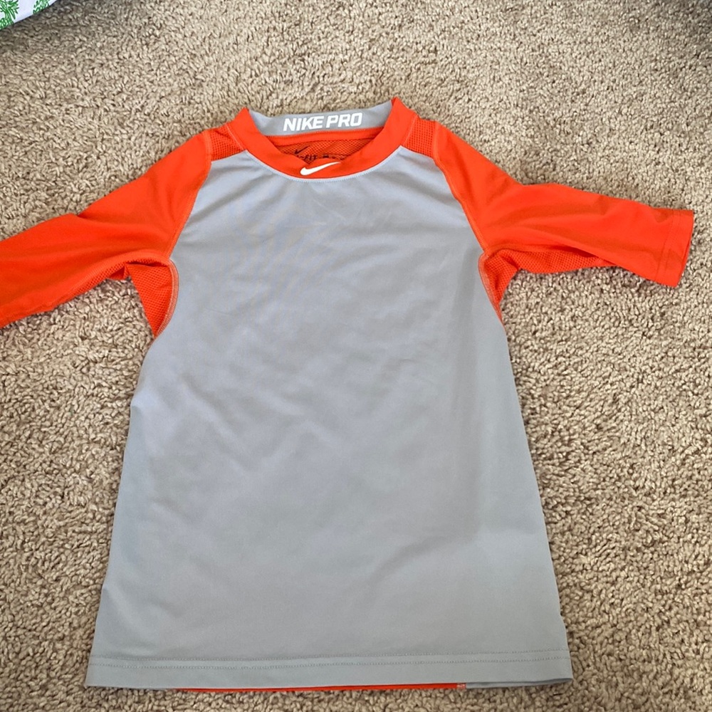 YXS orange Nike 3/4 sleeve dri-fit shirt